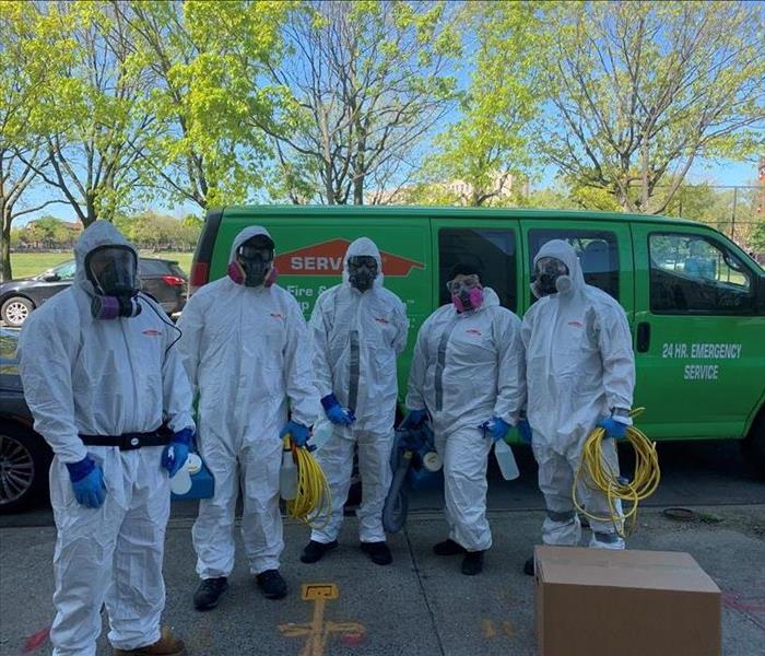 SERVPRO team in full PPE suits